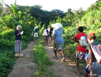 Students hauling sand