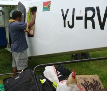 Luggage being loaded onto an Air Vanuatu plane